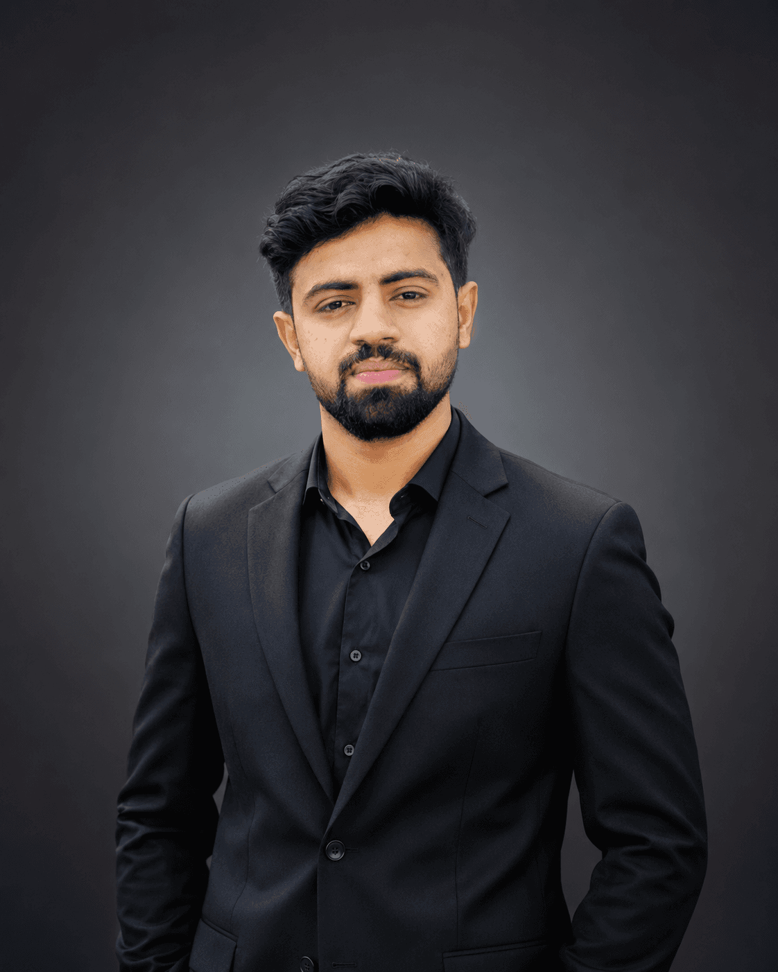 Abdul Moiz portrait in a professional indoor setting
